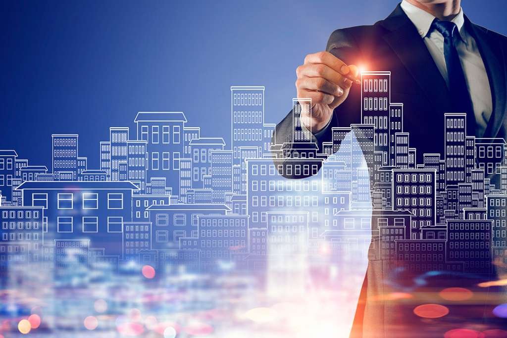 Business engineer drawing commercial real construction project on screen